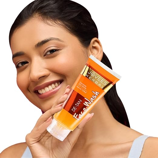 Jovees De-Tan Herbal Face Wash for brightening and tan removal.