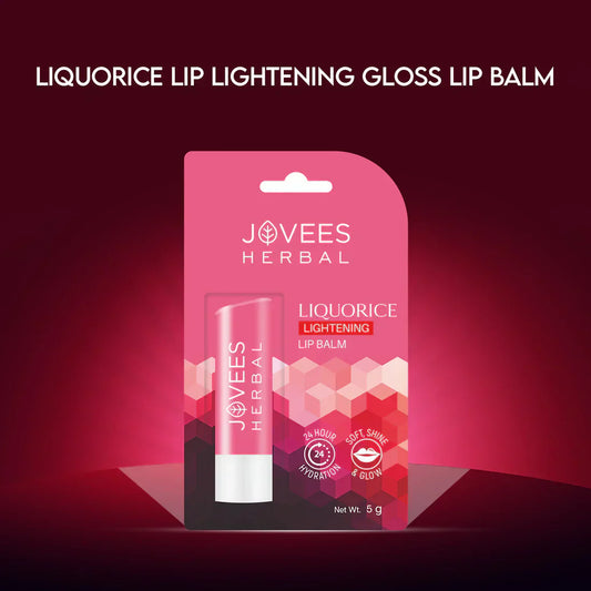 Jovees Herbal Liquorice Lightening Lip Balm packaging against a pink background.